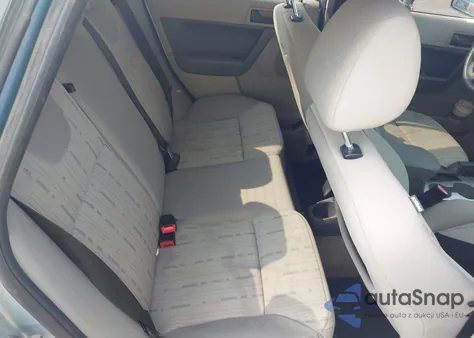 2009 Ford Focus Se z USA, uszkodzony, nr VIN 1FAHP35N89W241163